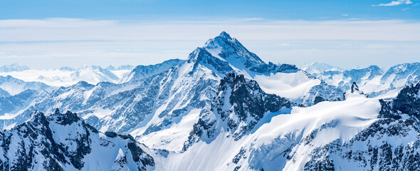 Switzerland, Panoramic view on Snow Alps and Blue Sky around Titlis mountain