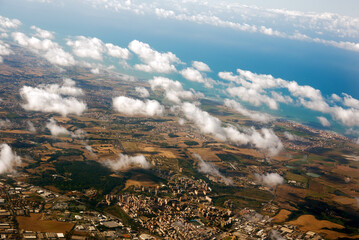 Aerial view of clouds above seaside