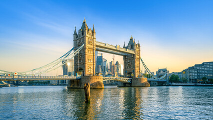 the famous tower bridge in london during sunrise