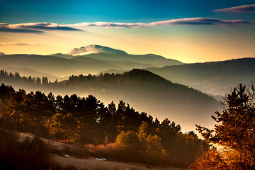 Amazing misty mountain landscape, forest in the fog, Bieszczady, Poland