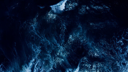 Top view dark blue sea water wave Big wave in black sea Top-down form aerial view Drone high quality camera.