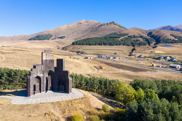 Drone view of Aparan Battle Memorial in Veratsnund Park on sunny summer day. Aparan, Aragatsotn Province, Armenia.