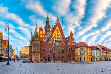 Multicolored houses and City Hall on Market square at sunset, Old Town of Wroclaw, Poland