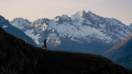 A man running in the Alps, France