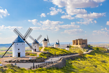 landscape mill spain clouds and castle La Mancha Consuegra with blue sky with clouds