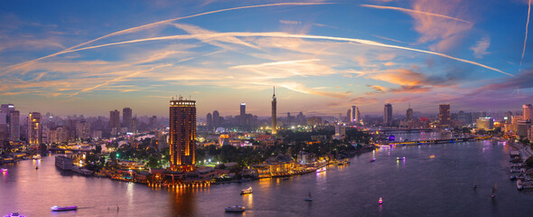 Wonderful purple sunset panorama of the Nile and Gezira island in Cairo, Egypt