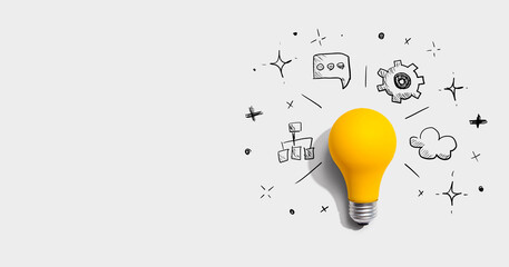 Brainstorming concept with a light bulb - Flat lay