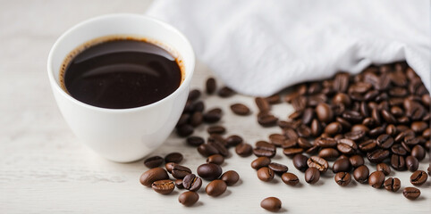serving a cup of coffee and a bag of coffee beans on the table 9