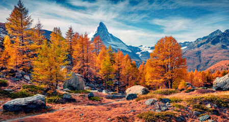 Spectacular morning view of outskirts of Grindjisee lake with Matterhorn (Cervino) peak on background. Stunning autumn scene of Swiss Alps, Zermatt resort location, Switzerland, Europe.