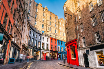 Colorful store fronts and old architecture along West Bow and Victoria Street in Edinburgh Old Town, Scotland