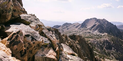Granite mountain peak, intricate details of stone surface, soft diffused light, eye-level camera angle.