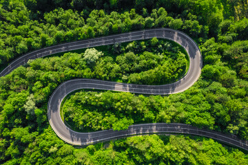 Aerial summer view of a winding mountain road forming an S-shape