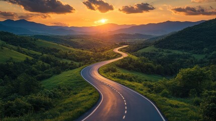 A winding asphalt highway stretching through lush green mountains under a dramatic sunset sky, with vibrant clouds, capturing the beauty of a serene road journey.