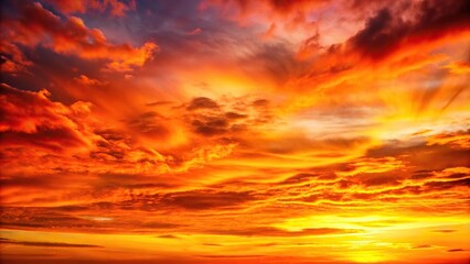 Gentle gradient of orange, yellow, and red tones stretching across the sky, natural beauty, sunset wallpaper, gentle transition, soft colors, calming atmosphere