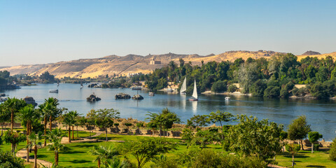 Aerial panoramic view of the Nile river with Feluccas (traditional egyptian sailing boats) in Aswan, Egypt