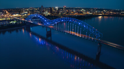 JULY 6, 2023 - MEMPHIS, TN, USA - Hernando De Soto Bridge LIGHT SHOW - Memphis, Tennessee over Mississippi River at night