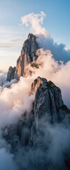 A snow-covered mountain landscape with soft, fluffy clouds