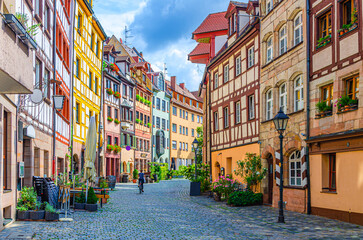 Old town Nuremberg city historical center, pedestrian street Tanner's Lane Weißgerbergasse with old medieval buildings colorful half-timbered houses, Middle Franconia region, Bavaria state, Germany
