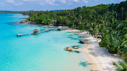 Experience the breathtaking beauty of Koh Kood Island, Thailand, featuring crystalclear waters and lush tropical landscapes