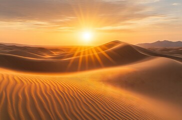 Golden sunrise illuminates the desert dunes.