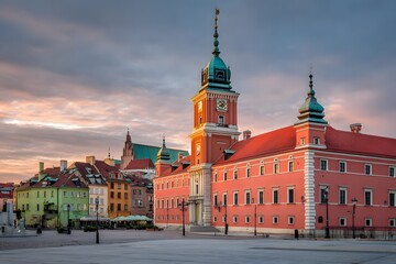 Warsaw Royal Castle: Captivating view of the magnificent Royal Castle in Warsaw, Poland, its vibrant facade standing proud against a dramatic, cloudy sky and historic cityscape.