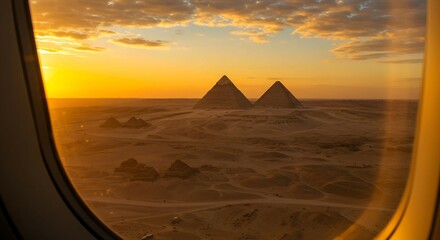 Beautiful aerial view Airplane wing flying plane jet over egypt, view from a window at sunset in summer 