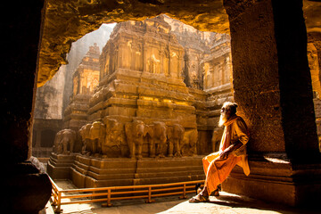Hindu Sadhu the holy men visiting the Kailasa Temple, Ellora caves, UNESCO world heritage side.
