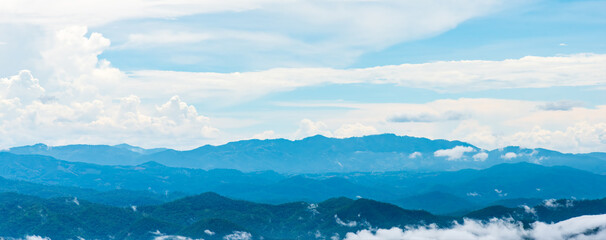Landscape of mountains range with morning frog for panorama mountain background.