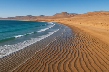 Desert Sand Dunes Meeting Turquoise Blue Sea at Coastal Edge