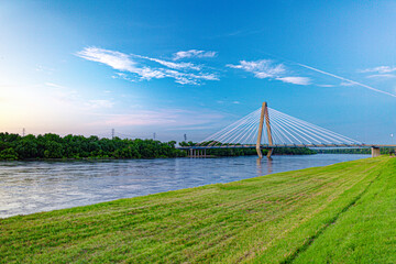 Cable-stayed Bond Bridge over Missouri River at sunset