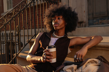 Leisure time with coffee in city sunset