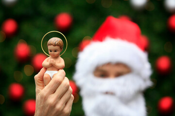 Santa Claus meets Jesus. Paris. France.