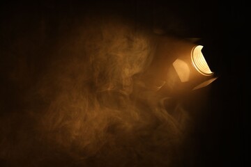 Professional lighting equipment without reflector and smoke on dark background. Space for text
