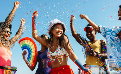 People celebrate at colorful carnival outdoors