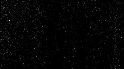 Freeze motion of natural snow falling on black background