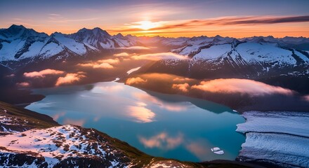 Sunrise Over Snowy Mountain and Lake: A breathtaking sunrise paints the sky in vibrant hues over a serene lake, reflecting the majestic snow-capped mountains.