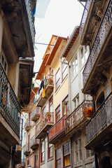 Colorful old residential buildings with balconies in Porto, Portugal