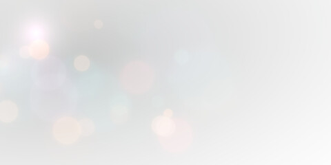 Fantasy holiday golden glow effect with glittering particles and soft shining festive light.