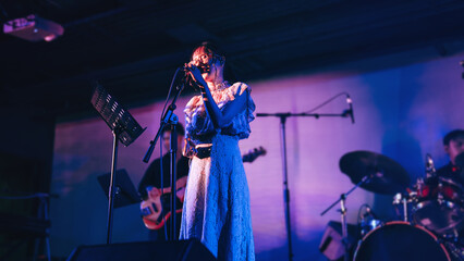 asian woman singer on stage good vibes live performance vocalist singing city pop music at live house