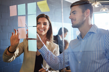 Planning, sticky notes or people in meeting with glass wall, feedback or idea for company proposal. Happy, team or marketing director in office with board, collaboration or brainstorming for campaign
