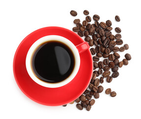 Aromatic coffee in cup and beans isolated on white, top view