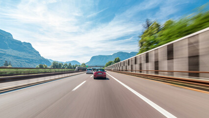 Driving on a highway through the mountains and meadows in Italy timelapse hyperlapse drivelapse