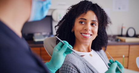 Dental, checkup or woman in clinic with smile, advice or examination for decay prevention. Healthcare, guidance or dentist in hospital with tools, consultation or teeth inspection for mouth health.