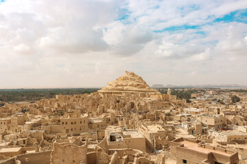 Mountain of the Dead and the ruins of the city of Shali in the Siwa Oasis, Egypt