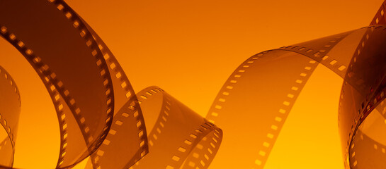 Abstract colorful cinematic background with film strip