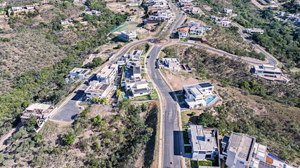 Newly built upper-middle-class homes in the Solar da Serra condominium, in the mountainous region of the Botanical Garden of Brasília. Brazil. 2024