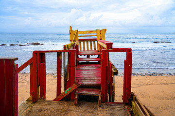 Dilapidated wooden structure on the beach of La Perla neighborhood in San Juan, the capital city of Puerto Rico in the Caribbean