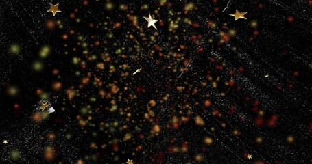 Glittering dense cluster of colorful bokeh lights radiating on black set, with gold star confetti