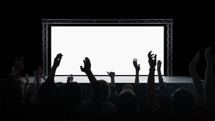 Live event production presents large blank stage screen before audience. Concert staging, media presentation setup, public event organization, entertainment production.