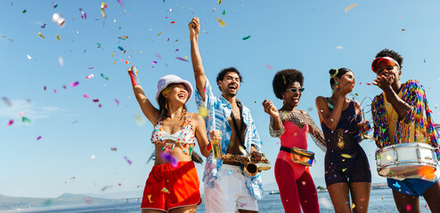 Celebration on the beach with music and confetti